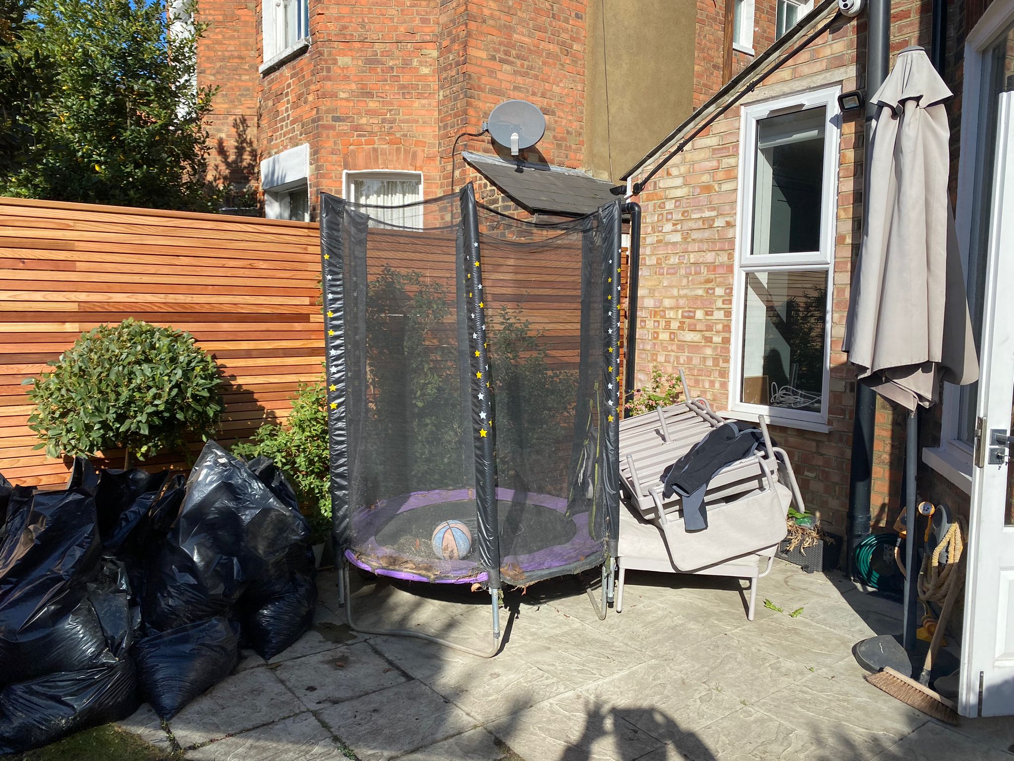 before garden design trampoline